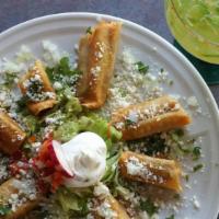Taquitos De Mariscos · Eight Pieces. Corn tortillas filled with stir-fried shrimp, tilapia, prawns, and pico de gal...
