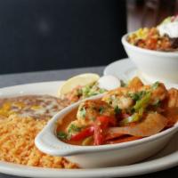 Camarones Rancheros · Good grilled shrimp cooked with bell peppers, onions, cilantro, and our favorite Spanish sau...