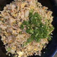 Chashu Fried Rice · Onions, carrots, green onions, egg, and chopped chashu pork with rice.