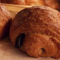 Chocolate Croissant · A chocolate-filled, golden, buttery, layered and flaky textured croissant, delicious, light ...