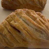 Apple Turnover · Tender chunks of baked apples wrapped in a flaky scrumptious puff pastry shell, perfect for ...