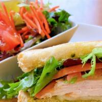 Turkey And Pesto · Turkey, pesto sauce, provolone cheese, green vegetable mix, sliced tomatoes, rustic bread, s...