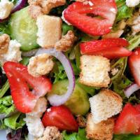 Berry Salad · Fresh strawberries, feta cheese, mixed green vegetables, cucumber, red onion, house-made cro...