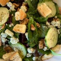House Salad · Mixed green vegetables, carrots, cucumber, tomatoes, house-made croutons, choice of extra vi...