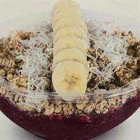 Vegan Berry Blast Acai Bowl · Acaí, dragon fruit, mango, and pineapple. Topped with granola, banana, and coconut.