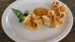 Mr. Crab Puffs · 4 wraps of crab meat with cream cheese, served with sweet and sour sauce.