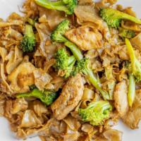 Phad See Ew · Wide rice noodles stir fried with egg and broccoli.