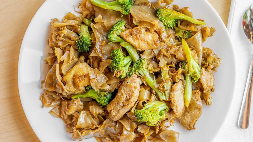 Phad See Ew · Wide rice noodles stir fried with egg and broccoli.