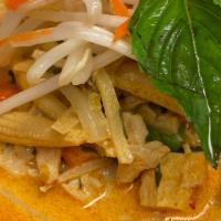 Tsunami Noodle Soup · Spicy. Bamboo shoots, bell peppers, basil in coconut milk and thai red curry sauce served ov...