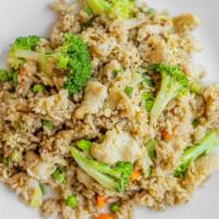 Curry Fried Rice  · Fried rice with egg, broccoli, carrots, onions, peas,and mild yellow curry