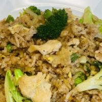 Thai  Fried Rice · Fried rice with peas, carrots, onions, broccoli, egg