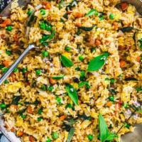 Basil Fried Rice · Fried rice with fresh basil, egg, peas and carrots, onions,and broccoli