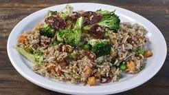 Grandma'S Fried Rice With Sausages  · Fried rice with egg, broccoli, onions, peas, carrots, and sausages.