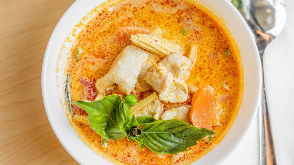 Red Curry + Rice · Spicy bamboo shoots, bell peppers, basil, peas / carrots, baby corn, onions in coconut milk and thai red curry sauce.