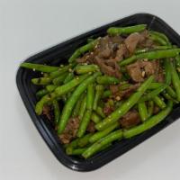 Black Bean Beef Green Beans · Fresh green beans wok tossed with tender beef in a house special black bean sauce.