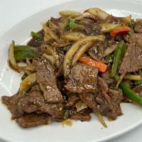 Black Pepper Beef 黑椒牛柳 · Sliced Beef Steak stir fry with onions and bell pepper in a house black pepper sauce.