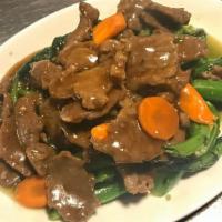 Beef With Chinese Broccoli · Sliced tender beef sautéed with seasonal fresh Chinese broccoli in a delicious oyster sauce.