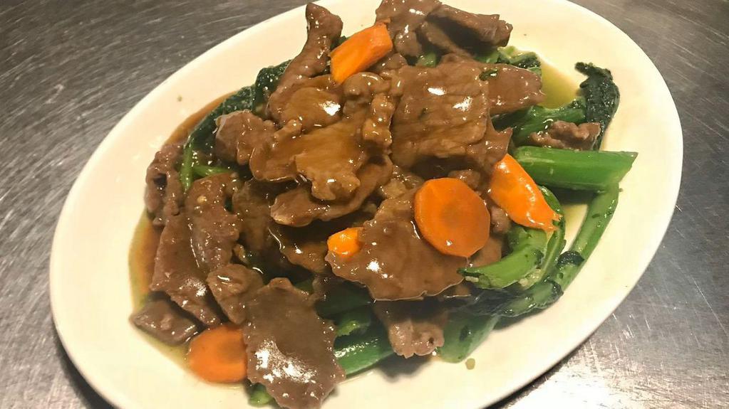 Beef With Chinese Broccoli · Sliced tender beef sautéed with seasonal fresh Chinese broccoli in a delicious oyster sauce.