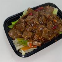 Gk Beef · Choice top sliced sirloin steak wok tossed in special hot sauce and placed on a bed of sauté...