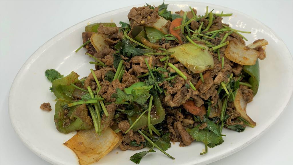 Cumin Lamb 孜然羊肉 · Halal Australian thin lamb slices wok tossed with onions, bell peppers in a house cumin sauce.