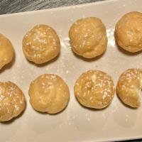 Cream Puffs (8) · Eight mini cream puffs.
