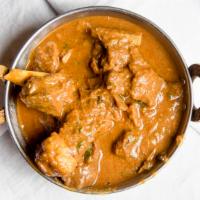 Goat Curry · Kashmiri delicacy cooked with intensely hot & fragrant spices
