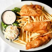 Guinness Fish & Chips · Fresh cod dipped in our original recipe of Guinness beer batter then fried golden brown. Ser...