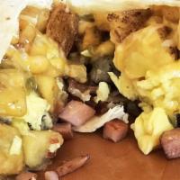 #12 Three Meat Biggie · Sausage, bacon, ham, egg, potatoes, green chile and cheese. 910 calories.