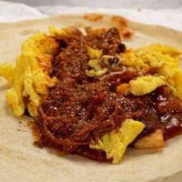 #07 Rio Grande · Carne adovada, egg, potatoes, red chile and cheese. 650 calories.