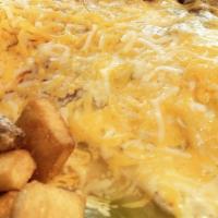 Enchilada Rancheros · Comes with 2 cheese enchiladas. Served with pan-fried potatoes, slow-cooked pinto beans, 2 e...