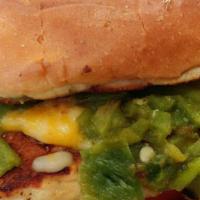 Nm Chicken Sandwich · Grilled bun, chopped green chile, cheddar, and Jack cheese, mayo, lettuce, and tomato. Bonel...