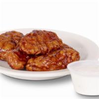 Regular Boneless Wings · Traditional (boneless) chicken wings hand tossed in Chipotle Pepper sauce, Traditional Buffa...