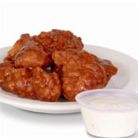 Large Boneless Wings · Traditional (boneless) chicken wings hand tossed in Chipotle Pepper sauce, Traditional Buffa...