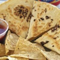 Kid Cheese Quesadilla · Comes with a small drink. 200 calories.