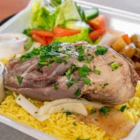 Braised Lamb Shank Plate · Rice, salad, vegetable stew.
