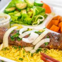 Kafta Kabob Plate · Rice, salad, vegetable stew. Extra skewer for an additional charge.