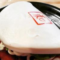 Char Siu Pork Bun (1) · Steamed bun lettuce, roasted pork belly, Japanese mayo, house made sauce.