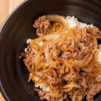 Beef Donburi · Sliced beef, onion simmered in chef special sauce over white rice.
