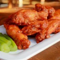 Blazing Chicken Wings (D) · Choice of bone in or boneless wings tossed in your choice of our house-made BBQ sauce, teriy...