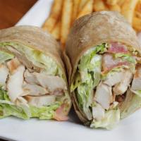 Grilled Chicken Caesar Wrap (D) · Grilled chicken breast/parmesan cheese/diced tomato/romaine lettuce tossed in house-made Cae...