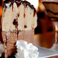 Mocha Mud Pie · Coffee and chocolate ice cream piled high on an Oreo cookie crust, topped with hot fudge, ho...