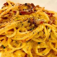 Spaghetti Carbonara · Pancetta, eggs, cream sauce, black pepper, parmigiano.