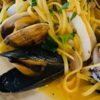 Linguini Ai Frutti Di Mare · Mussels, clams, and calamari sauteed with garlic, tomato or white.