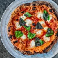 Margherita - · Red Sauce, Fresh Mozz, Basil, and Extra Virgin Olive Oil - 14