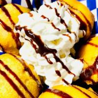 Deep Fried Oreos · (5) Deep Fried Oreos topped with ice cream and whipped cream and drizzled with chocolate and...