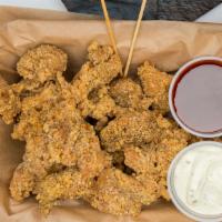 Popcorn Chicken · Our famous homemade popcorn chicken! Diced up chicken thigh meat breaded and made to order f...