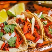 Street Tacos · Delicious corn tortilla filled with your choice of meet, garnished with chopped onions, cila...