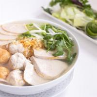 Peppery Pork Ball Noodle Soup - Bun Moc · Ground pork balls, laced with black pepper, sliced pork meat and Vietnamese ham with vermice...