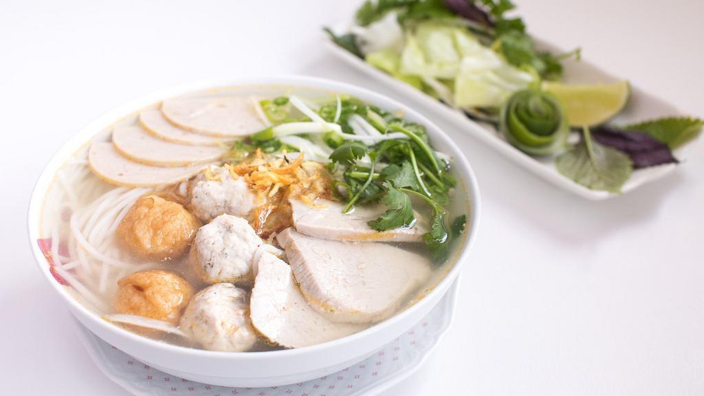 Peppery Pork Ball Noodle Soup - Bun Moc · Ground pork balls, laced with black pepper, sliced pork meat and Vietnamese ham with vermicelli noodles in pork broth