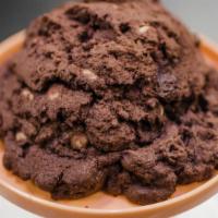 Choc Blocker · This dark chocolate big boi is stuffed with peanut butter chips and semi-sweet chocolate chu...